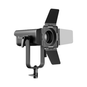 Professional LED studio light with barn doors for precise photography illumination.