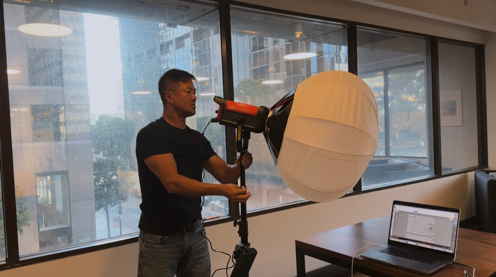 Photography studio lights mounted on adjustable light stands