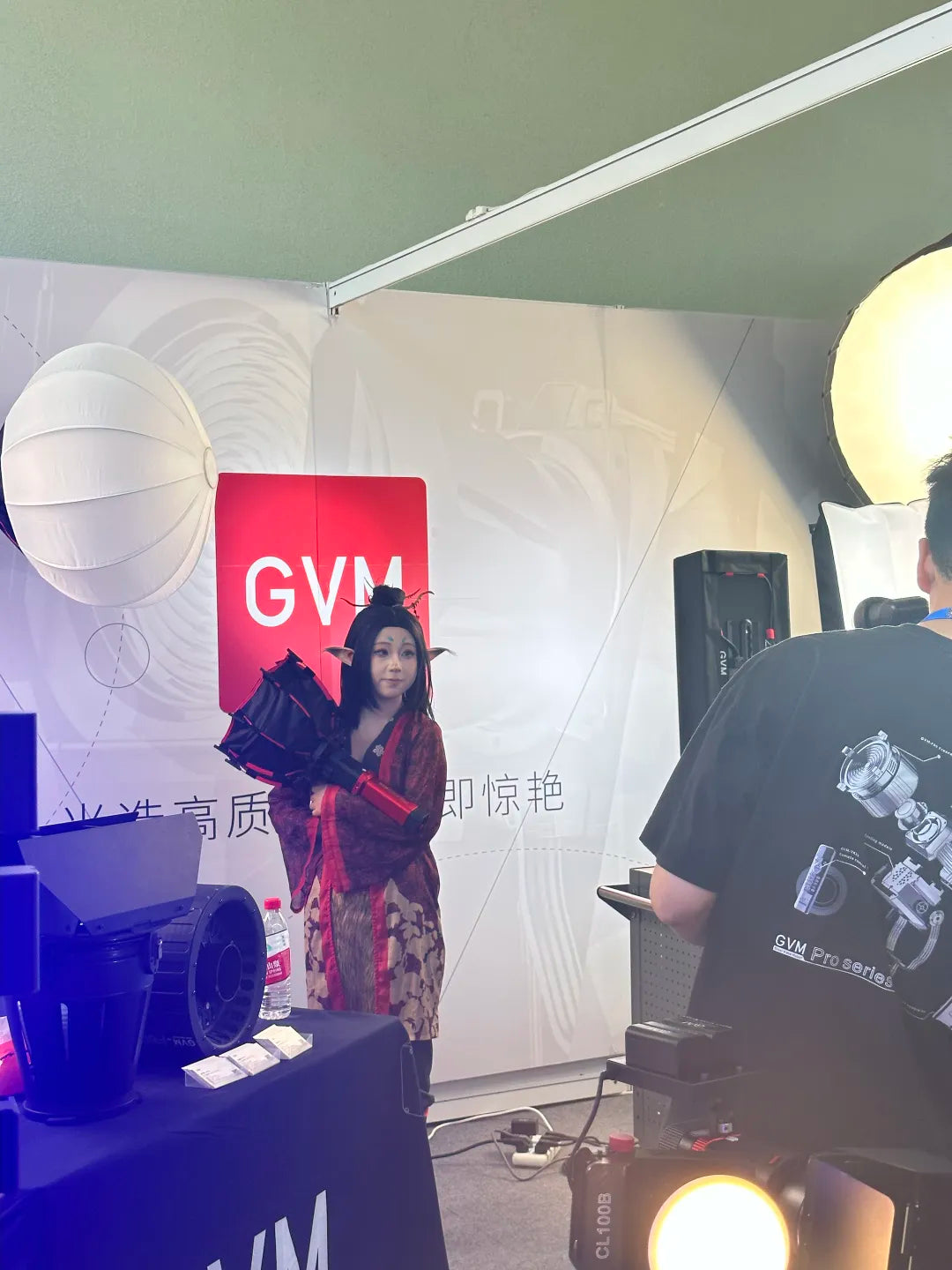 GVM’s Film Lighting Gear Wow at PE Beijing Innovation Focus 9 Cosplayer dressed as an anime character at the GVM booth during the film lighting expo.