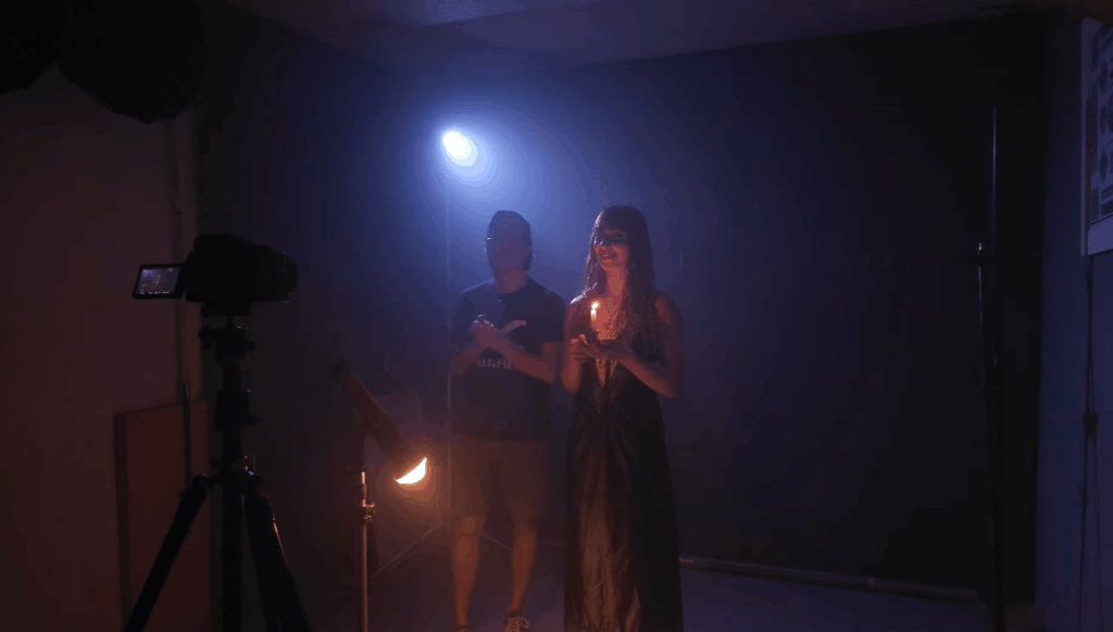The 60W Video Light: Your Ultimate Guide to Illuminating Creative Visions (2025 Pro Picks) 1 Content creator using a 60W video light for a shoot, illuminating a professional studio setup.