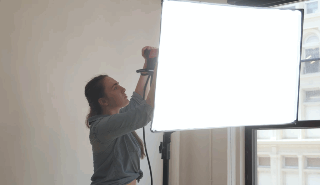 Movie Studio Lights & Film Lights: Color Science for Ideal Cinematic Tones 2 Professional film light equipped with a softbox for diffused, even illumination in a movie studio.