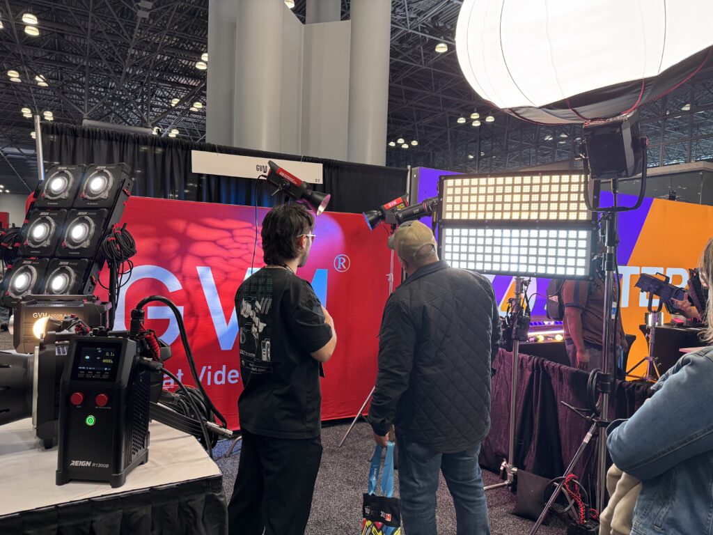 Beyond the Booth: GVM Unveils the Future of Lighting at BILD Expo 2025 1 The bustling GVM booth at BILD Expo 2025, showcasing the new Reign, Flathead, Ziptile, and AIO series of professional film and video lights to attendees.