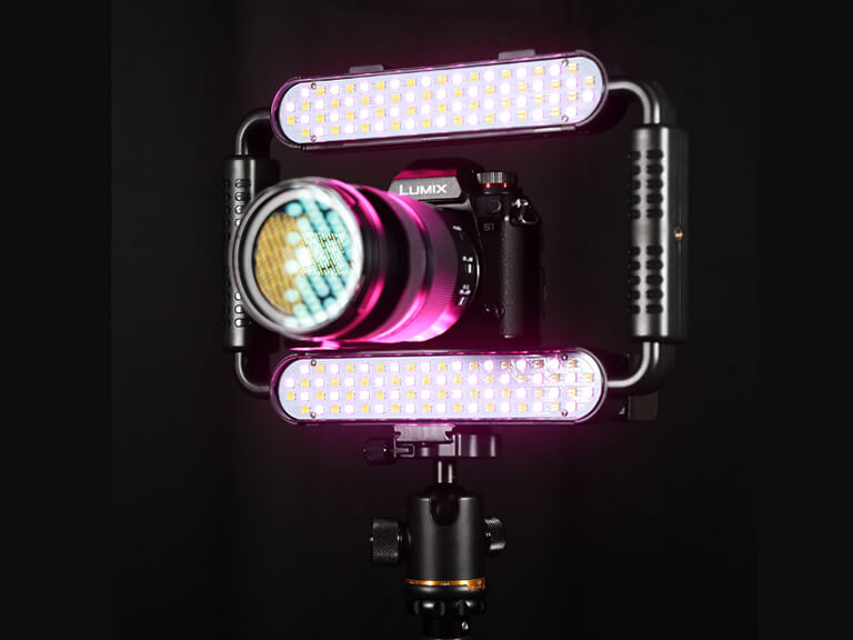GVM TL15RS RGB tube light, a versatile and portable LED video light, shown glowing with multiple colors to demonstrate its creative capabilities.