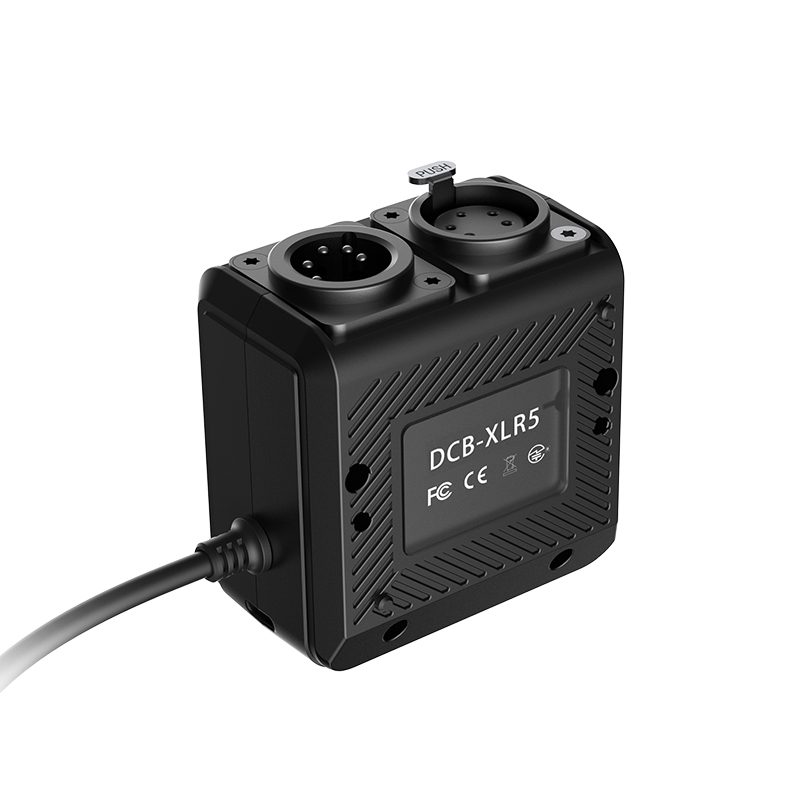 GVM SD1200B AIO 1200W Bi-Color Integrated Spotlight 9 A black DMX control box (DCB-XLR5) with XLR ports and a connected cable, providing professional wired integration for precise lighting control, essential for best video recording.