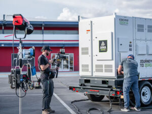 Essential Pet Photography Tips for Capturing Cute Images 24 A film clapperboard with "JUST CALL HER" written on it, symbolizing a movie studio production focused on mastering video lighting.