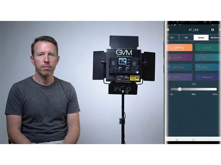 Split screen showing a man sitting next to a GVM LED light panel on a stand, and a smartphone screen displaying the GVM app 'Scene' mode interface with various lighting effects like 'Lightning' and 'Cop Car'.