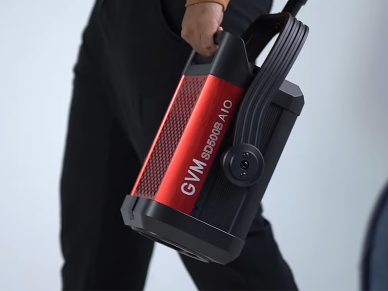 A professional GVM SD500B AIO studio light being prepared for high-quality product photography lighting in e-commerce.

