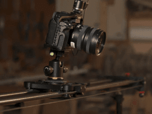 A camera on a slider during a video shoot.