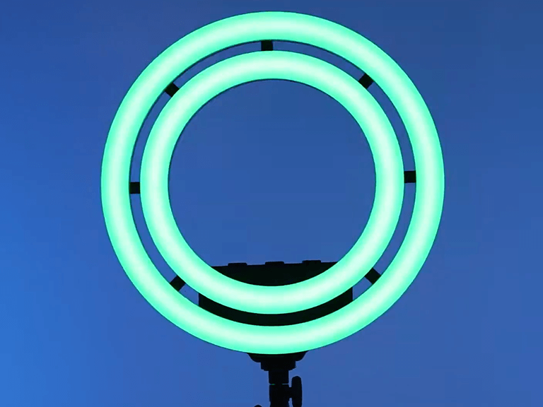 Ring Light for Photography with vibrant green color effect, showcasing dynamic RGB lighting modes ideal for creative portrait shots and video production.