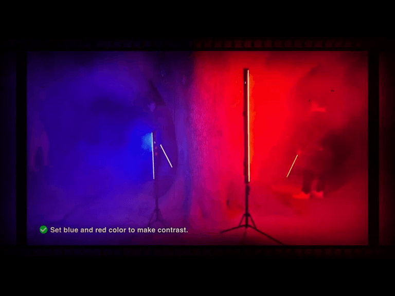Best Tube Light for Photography 2026 2 Dual GVM tube lights for photography creating dynamic red and blue mood lighting in a dark studio environment.